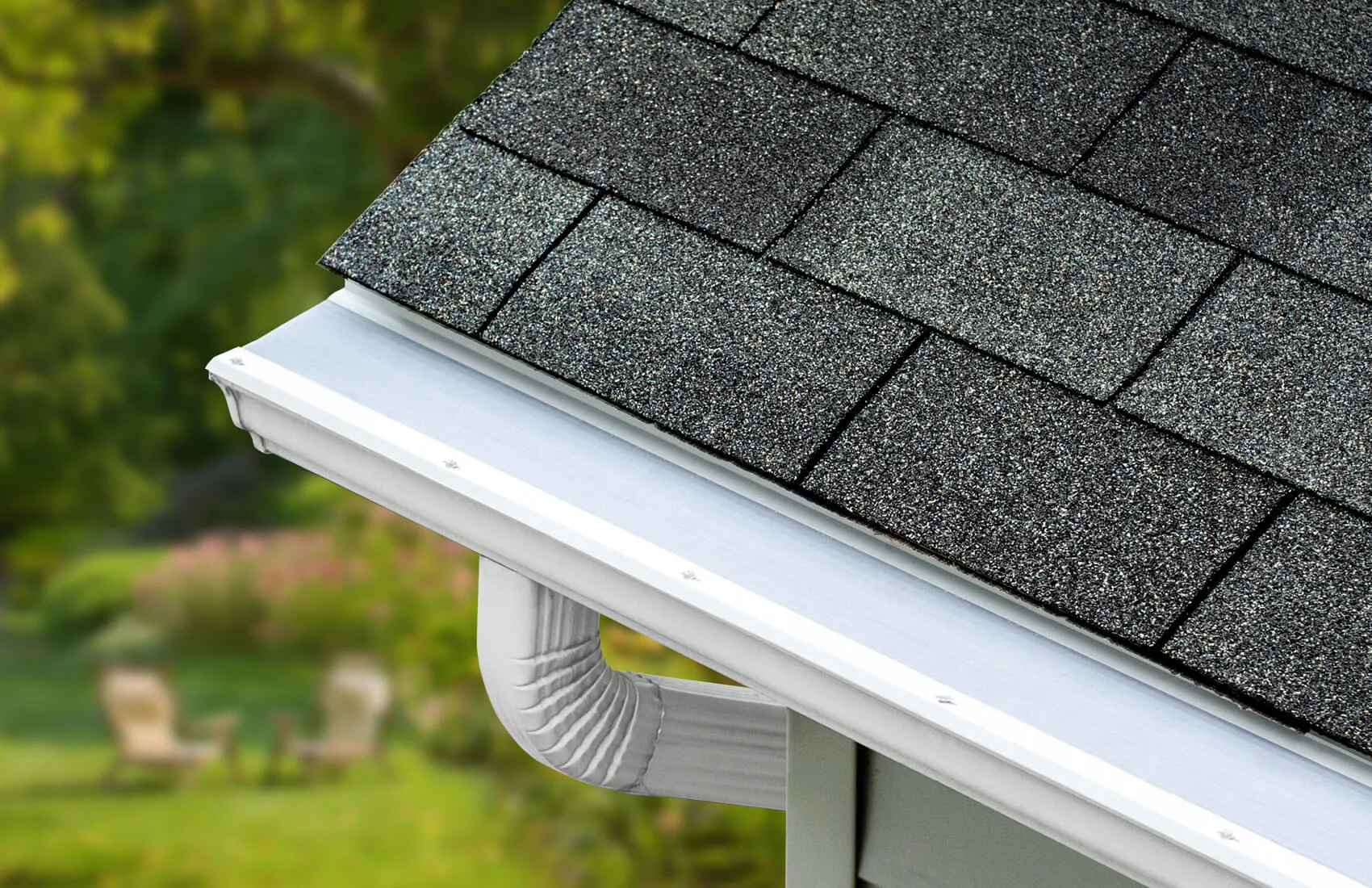 Roof gutter with leaf guard.